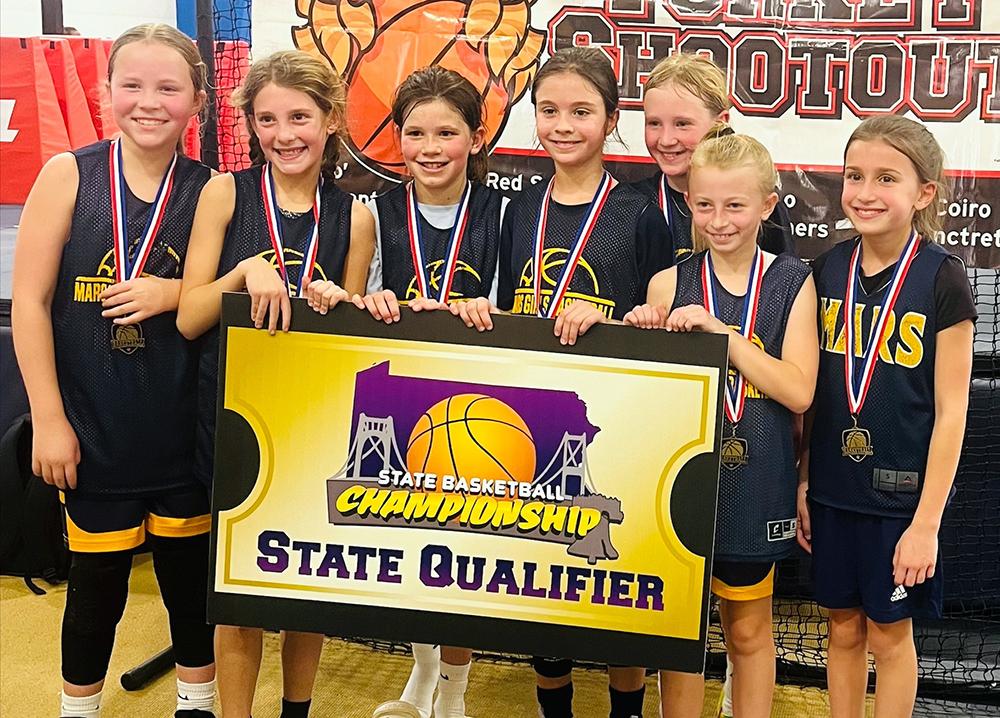 Mars Girls Youth Basketball Assoc-iations’ Fourth Grade Girls Gold Travel Basketball Team earned first place in the New Castle Turkey Shootout Tournament.