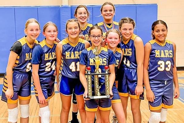 Mars Girls Youth Basketball Assoc-iations’ Sixth Grade Girls Gold Basketball Team took second place in the St. Gregory’s Cold Turkey Shootout Tournament